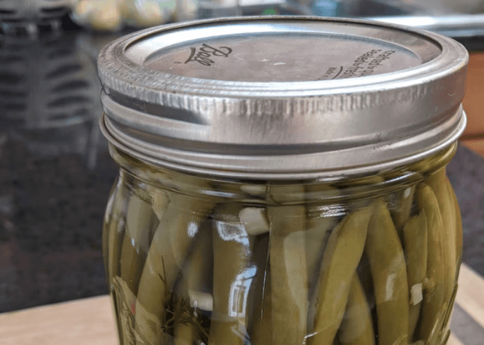 Mason jar with pickled green beans