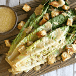 Grilled Caesar Salad on a wood cutting board
