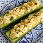 Egg salad in cucumber boats