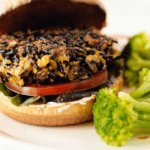 Wild Rice Hamburgers on a bun with broccoli florrets