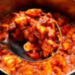 Healthy Turkey Chili in a pot with tomatoes