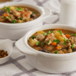Slow Cooker Chicken Stew in two dutch oven pots