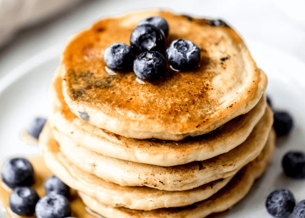 stacked pancakes with blueberries