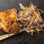 shredded pork butt on a countertop